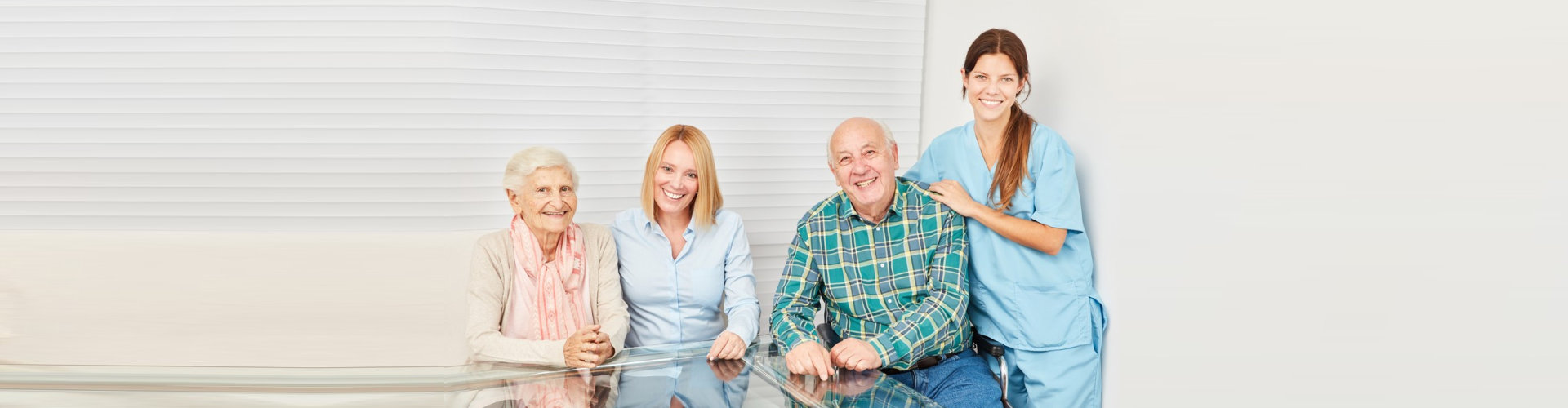 caregivers along with their patients smiling